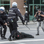 PHOTO OLIVIER PONTBRIAND, LA PRESSE -- Sur cette photo;Des protestataires contre le grand prix de  formule un de  montreal tentent de perturber les activités de la formule 1- 30 - section Photo  reference #533054